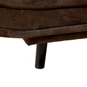 Nahaufnahme eines braunen Funktionssofas mit schwarzem Bein, seitliche Perspektive