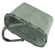 Groene boodschappenmand met stevig frame en handvat, gezien van onderaf.