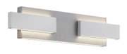 Moderne Wandleuchte RIVERA von Musterring in seitlicher Perspektive, mit zwei rechteckigen Lichtquellen auf einer metallischen Basis.