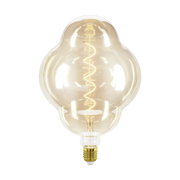Große, dekorative Glühbirne mit spiralförmigem Filament, frontal abgebildet.