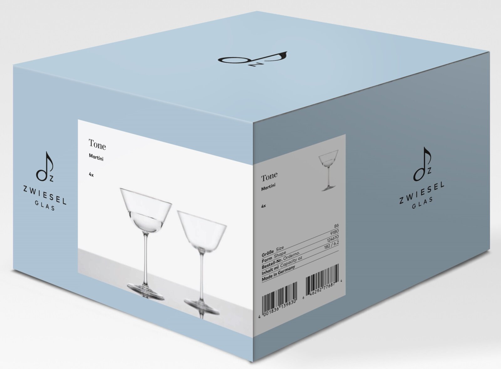 Hellblaue Produktverpackung von Zwiesel Glas für „Tone Martini“ (4er-Set) mit abgebildeten Martini-Gläsern, schräg von vorne/rechts in leichter Draufsicht fotografiert.