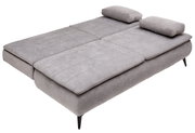 Grijze boxspring-functiebank in uitgeklapte stand, zijaanzicht