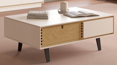 Alberto Martinelli Couchtisch EVORA Moderner rechteckiger Couchtisch in Beige mit Holzschublade und schwarzen schrägen Beinen, auf der Tischplatte liegen Bücher und eine Tasse, fotografiert aus leicht erhöhter Frontperspektive.