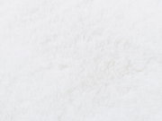 Nahaufnahme eines weißen Fellteppichs aus der Vogelperspektive