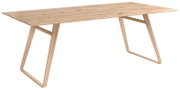 Moderne houten eettafel met schuine poten, zijaanzicht