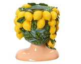 Keramik-Blumentopf in Form eines Kopfes, dekoriert mit gelben Zitronen und grünen Blättern, Frontalansicht