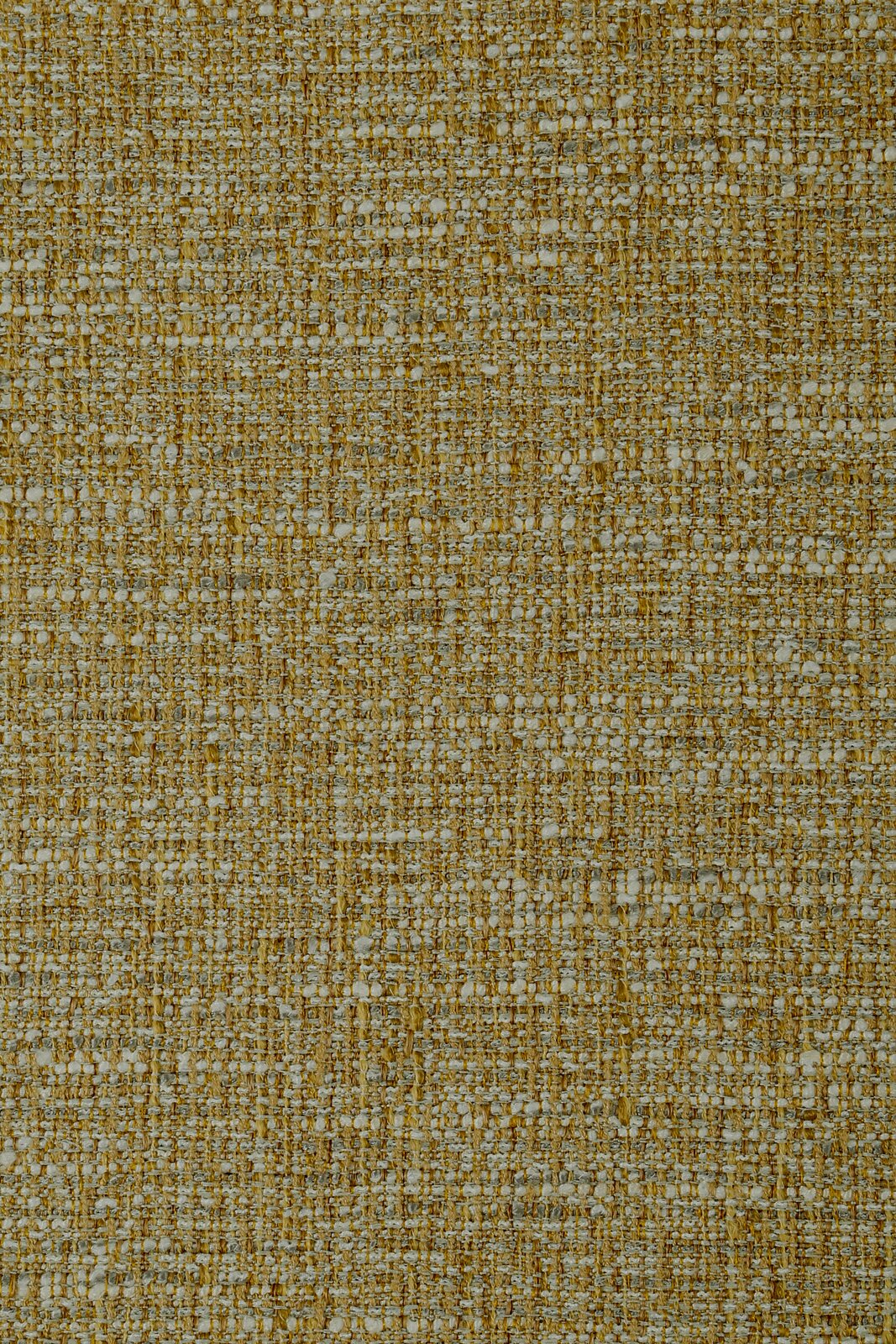 Nahaufnahme eines strukturierten, gewebten Stoffes in Gelb- und Grautönen, von oben betrachtet.