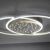 Moderne Deckenleuchte aus Stahl mit kreisförmigem Design und integrierten LED-Lichtern, seitliche Perspektive