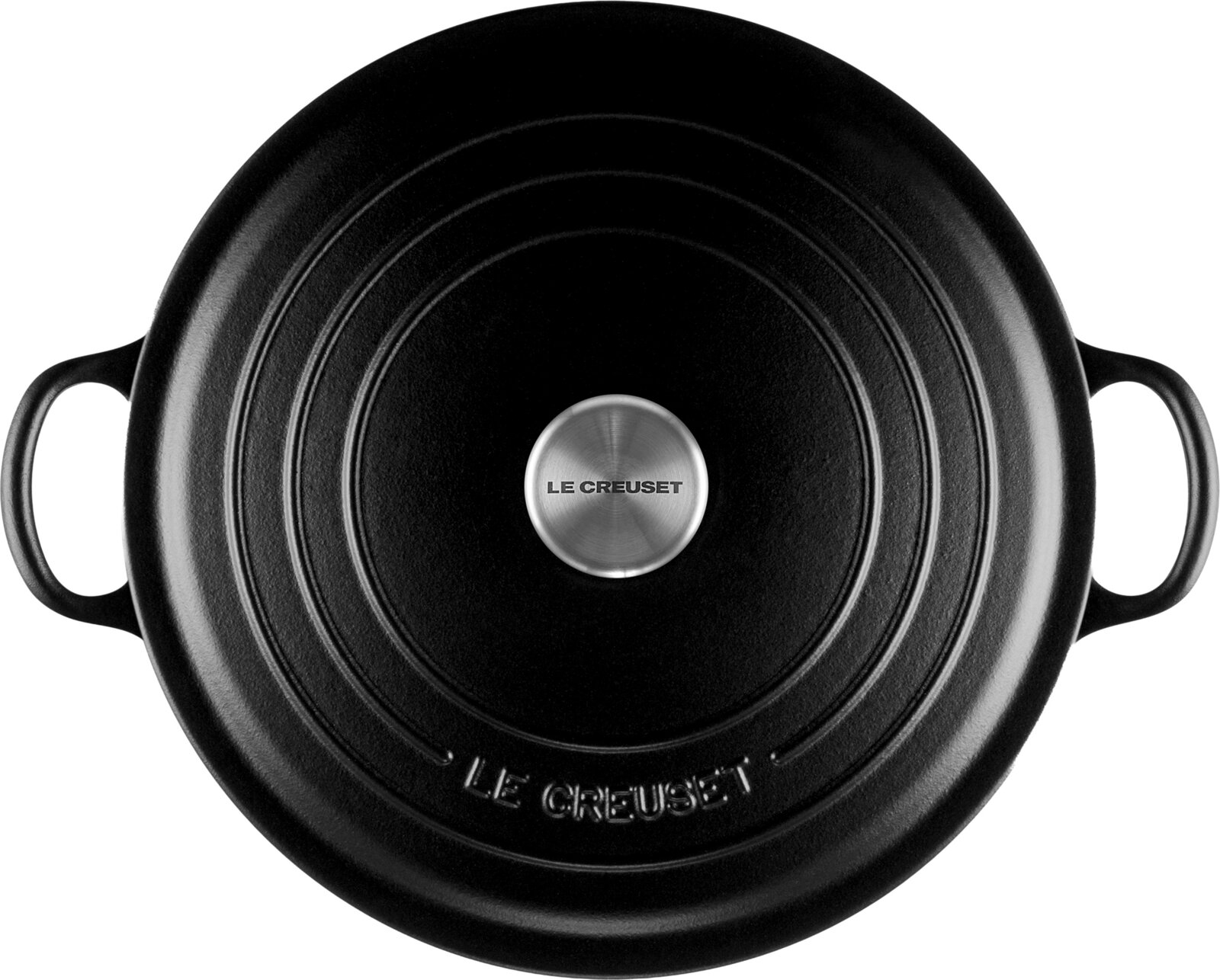 Bovenaanzicht van een ronde zwarte Le Creuset-braadpan met deksel, twee handgrepen en een zilverkleurige knop