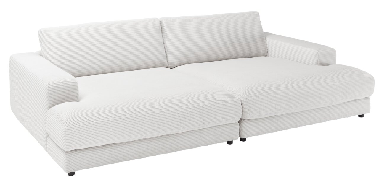 Kleine witte megasofa met geribbelde stoffen bekleding, zijaanzicht
