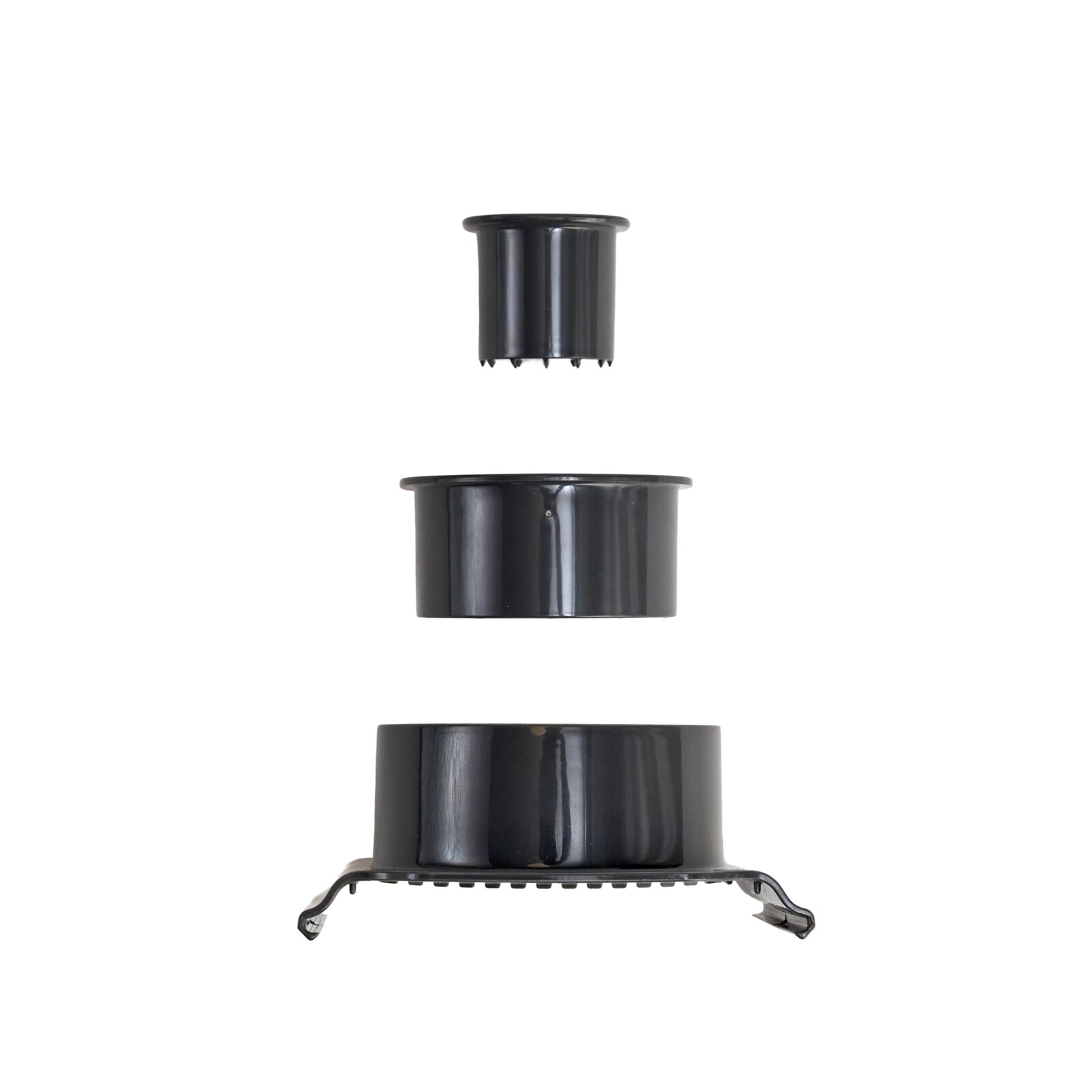 Schwarzer Kunststoff-Einsatz/Adapter in drei Größen, freigestellt auf weißem Hintergrund, Seitenansicht (frontal).