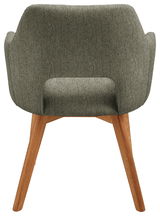 Rückansicht eines Sessels mit grünem Stoffbezug und Holzbeinen