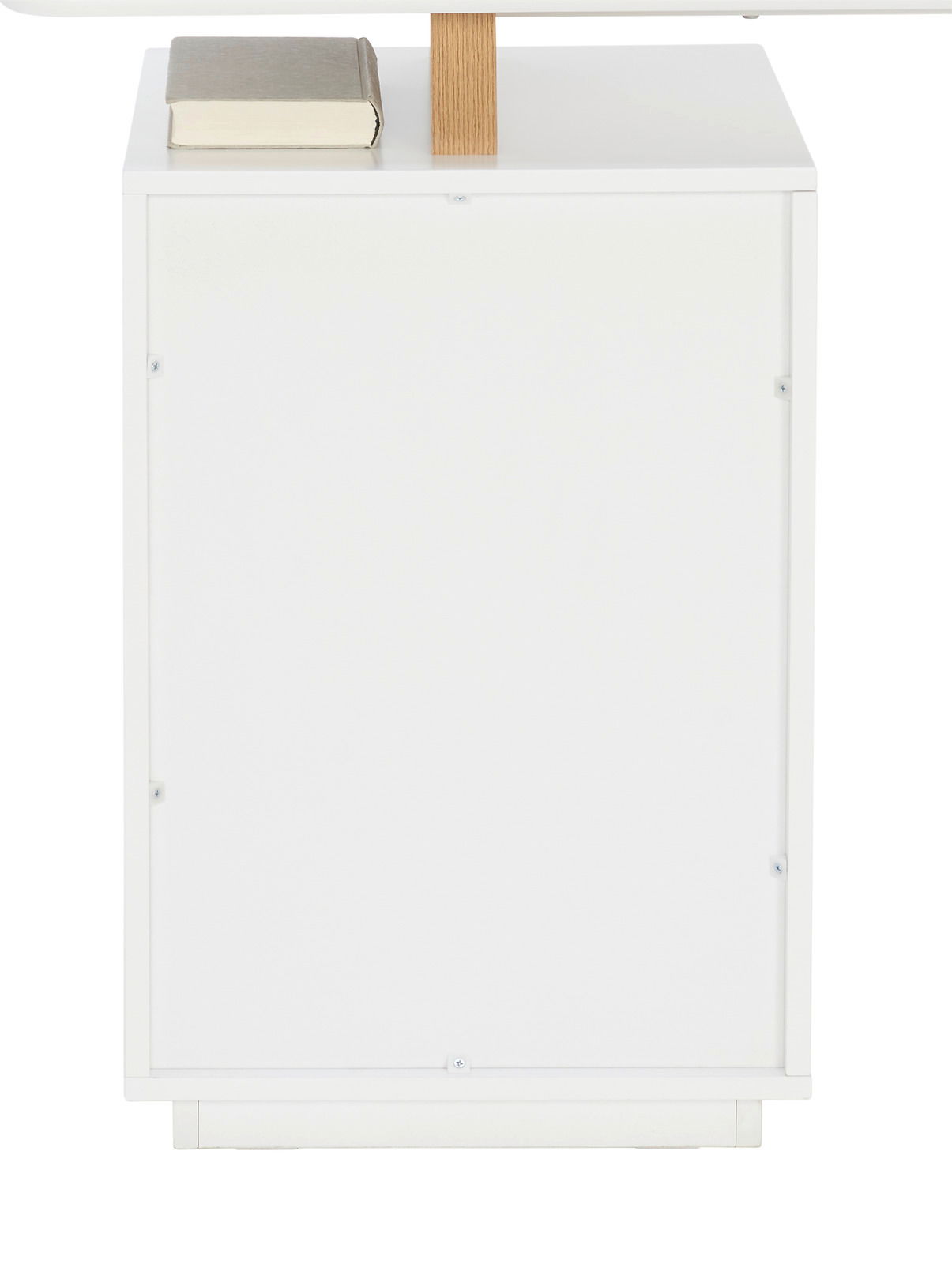 Seitenansicht eines weißen Schreibtischs mit einem Buch darauf