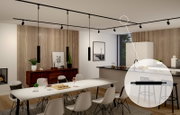 Moderner Wohnraum mit Schienensystem und Switchdimmer Zigbee in der Decke, seitliche Perspektive.