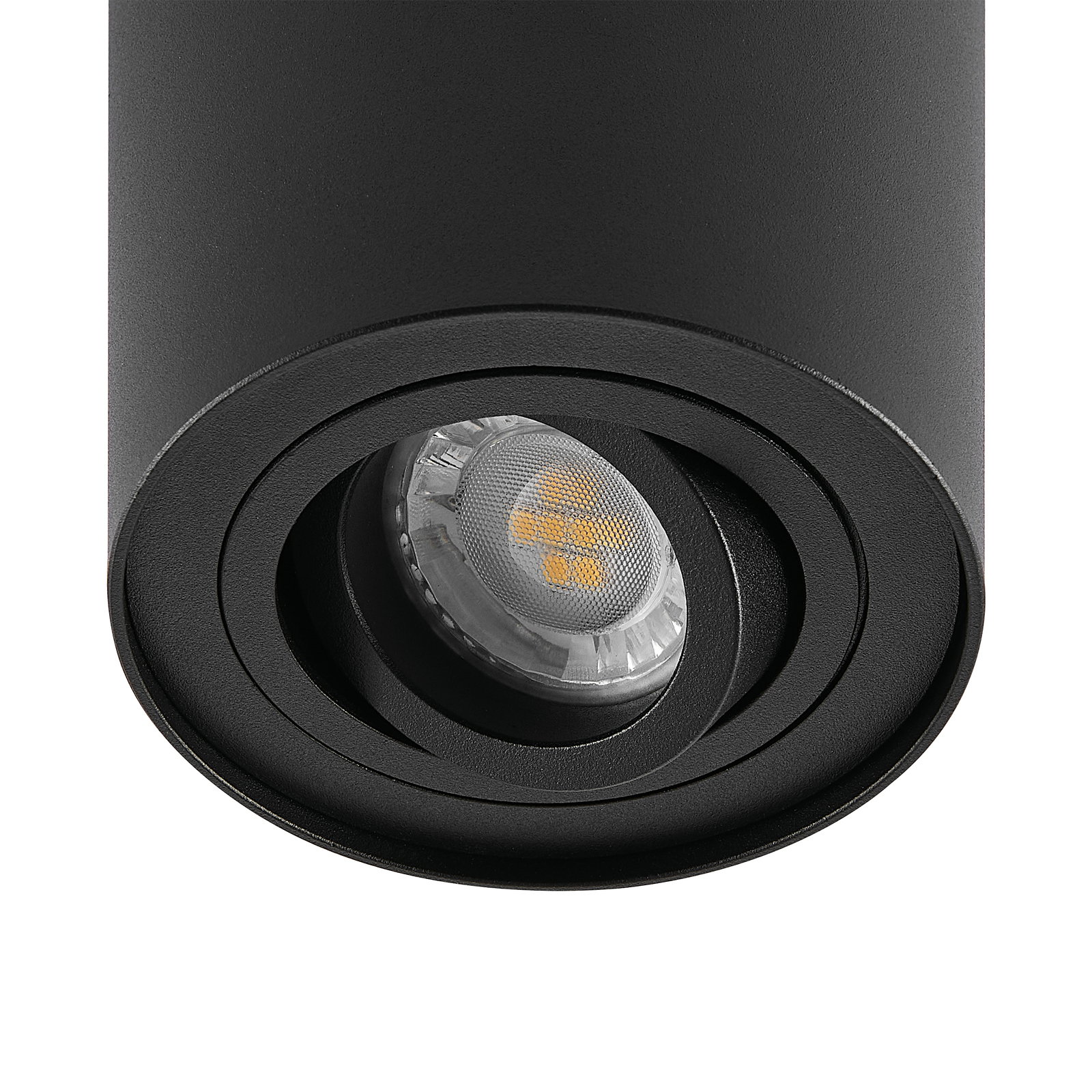 Nahaufnahme eines schwarzen zylindrischen Strahlers mit sichtbarer LED-Lampe, von unten betrachtet.