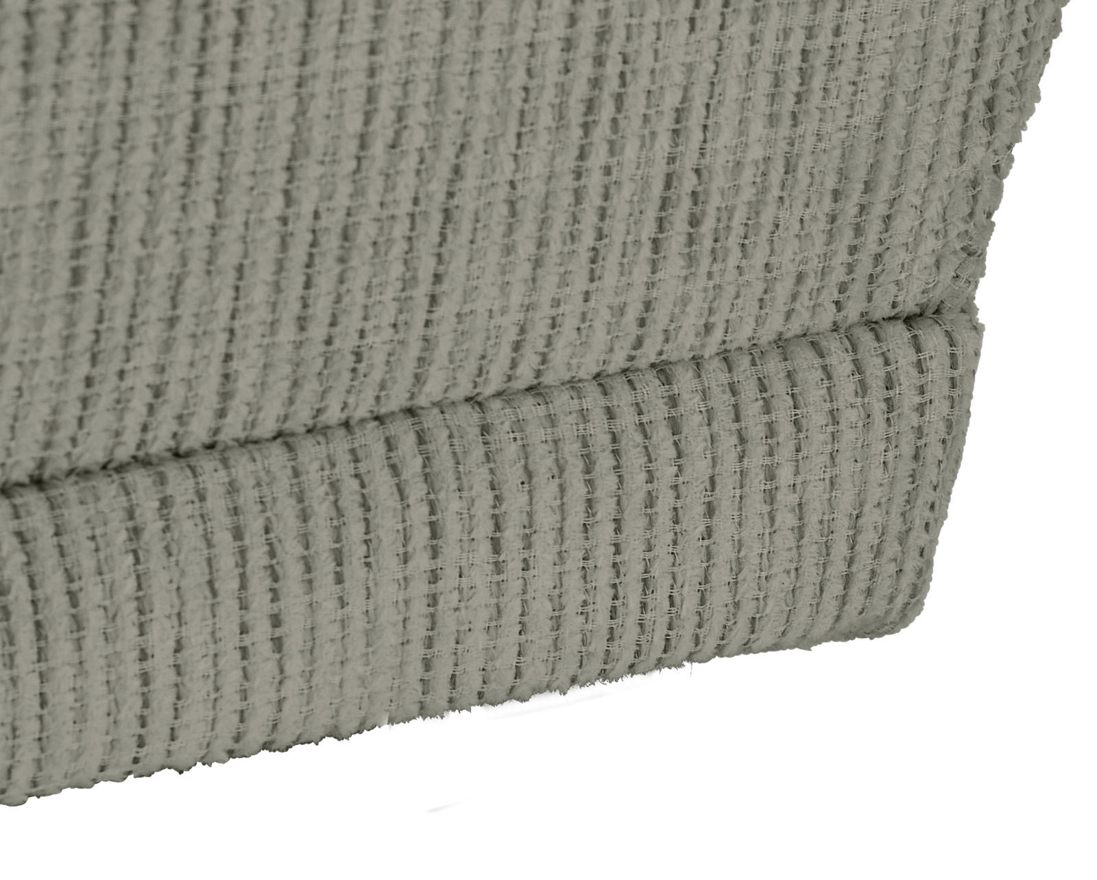 Nahaufnahme des strukturierten Stoffes einer Recamiere, seitliche Perspektive