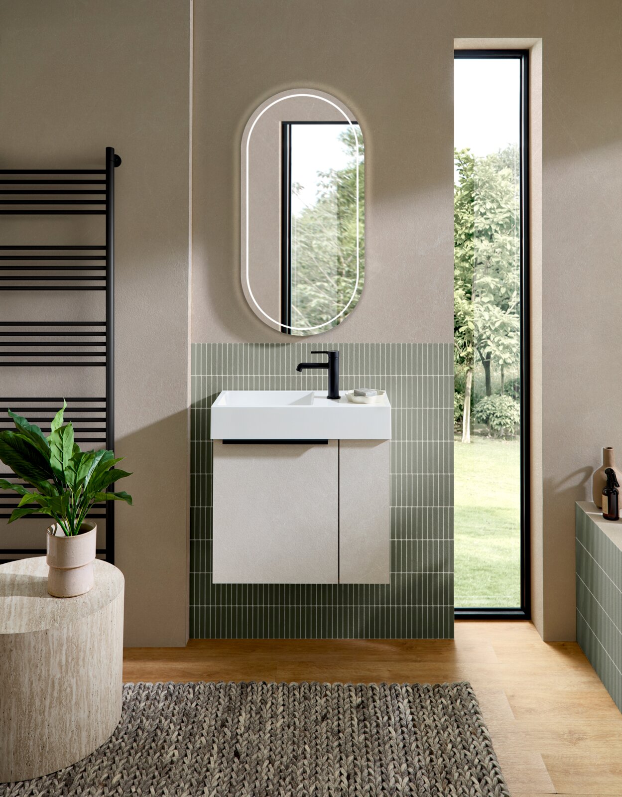 Modernes Badezimmer-Waschtisch-Set mit wandhängendem Unterschrank, weißem Aufsatzwaschbecken, schwarzer Armatur und ovalem LED-Spiegel, Frontalansicht