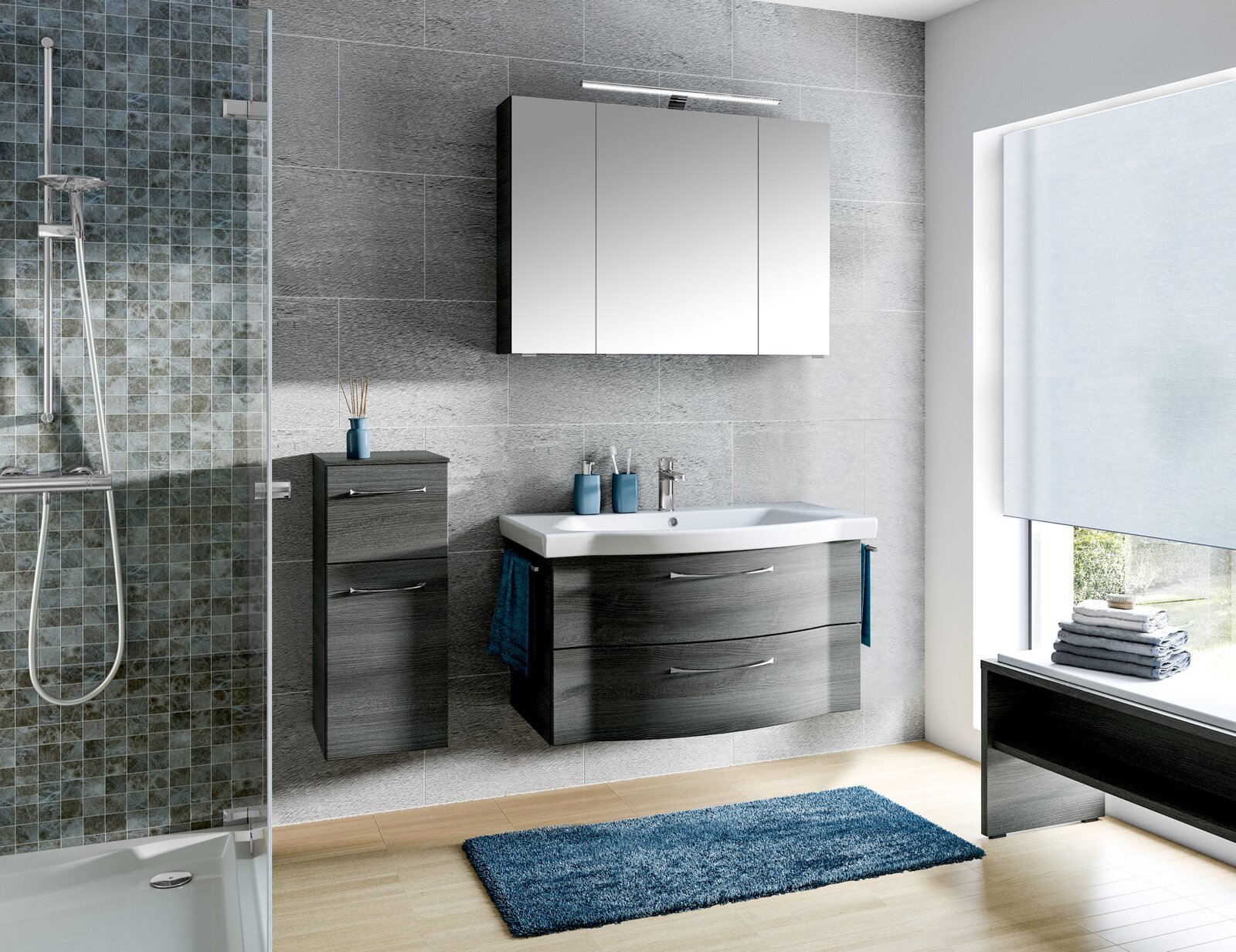 Modernes Badezimmer mit grauem Badblock, bestehend aus einem Waschbecken mit Unterschrank und einem Hängeschrank, seitliche Perspektive.
