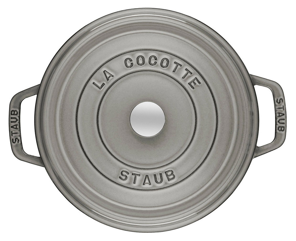 Runde graue Cocotte von oben mit der Aufschrift 'La Cocotte Staub' auf dem Deckel.