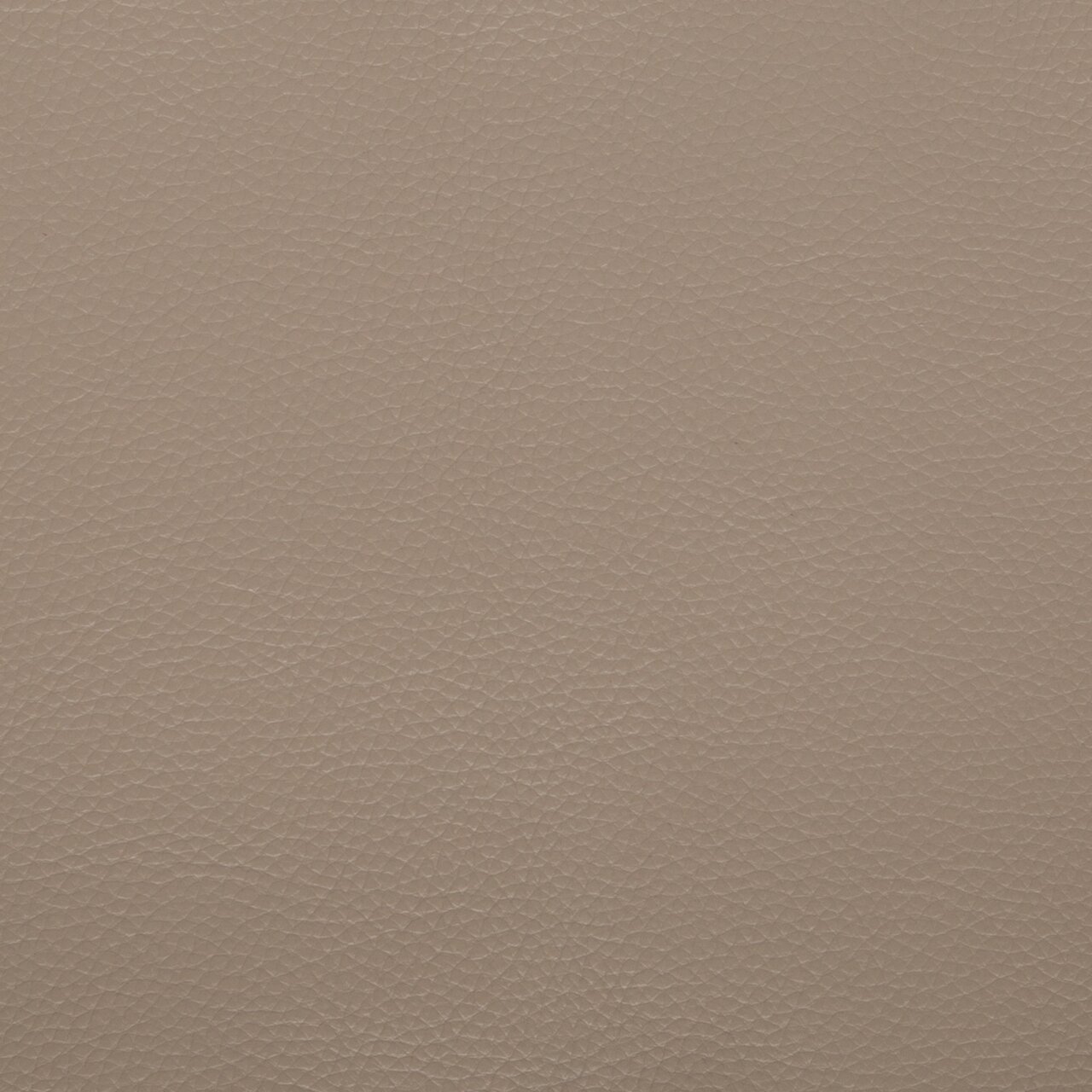 Close-up van een beige, fijn generfd oppervlak van leer of kunstleer, van bovenaf gefotografeerd (top-down-perspectief)