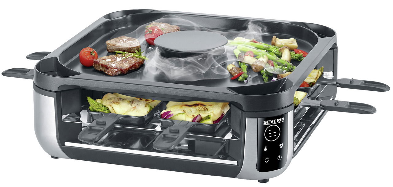 Smokeless Raclette-Grill mit dampfendem Grillgut und Pfännchen, seitliche Perspektive