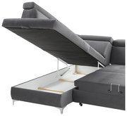 Graue Rundecke mit hochgeklappter Sitzfläche, die Stauraum darunter zeigt. Perspektive von der Seite.