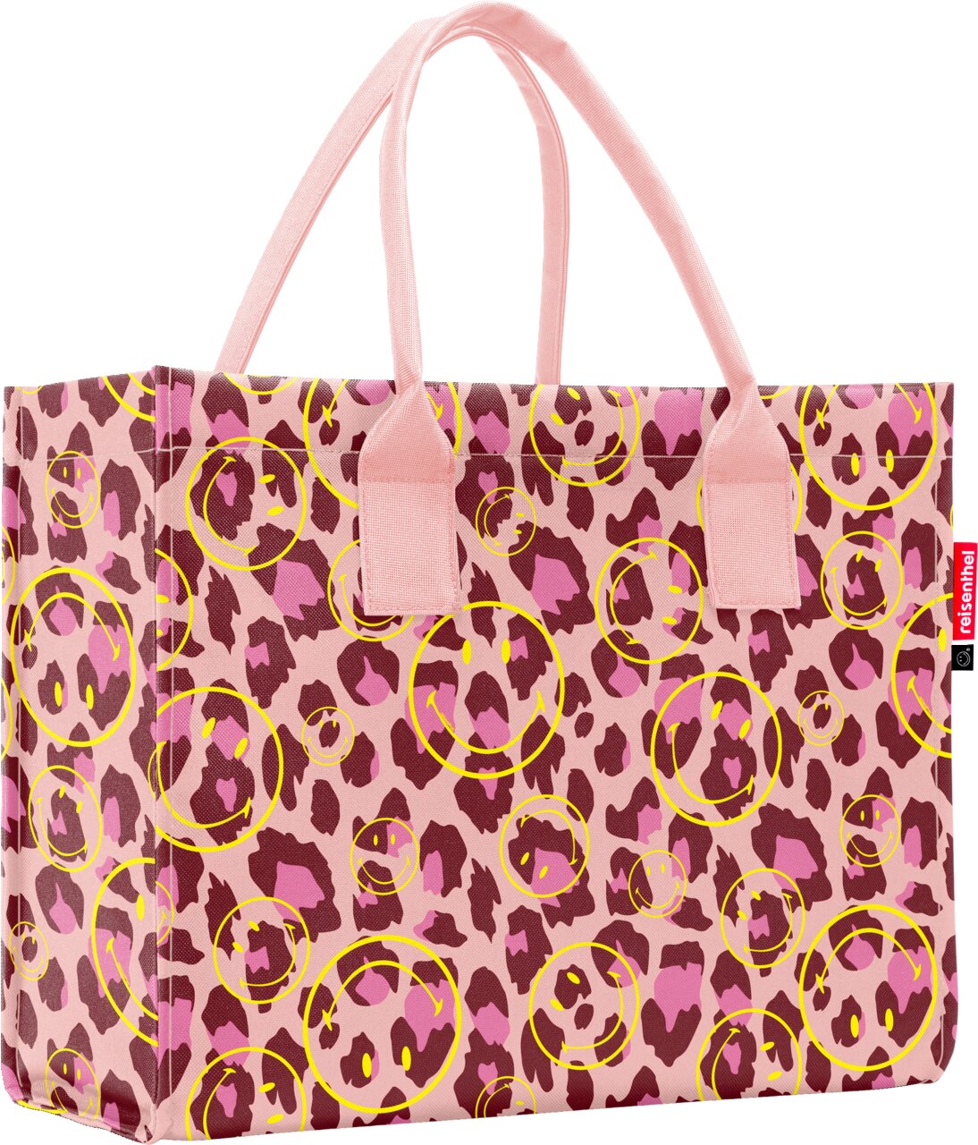 Reisenthel Einkaufstasche in Rosa mit Leo-Print und gelben Smiley-Motiven, mit zwei rosa Tragehenkeln, frontal in leichter Seitenansicht vor weißem Hintergrund