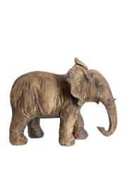 Holzelefant von der Seite betrachtet, mit detaillierter Struktur und natürlicher Holzoptik.