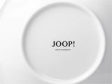 Unterseite eines weißen Tellers mit der Aufschrift 'JOOP! MADE IN GERMANY', von oben fotografiert.