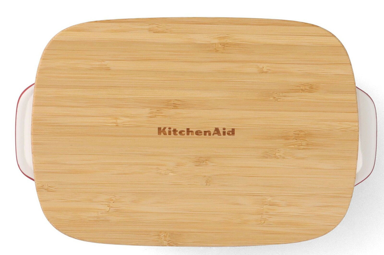 Aufsicht auf eine KitchenAid Auflaufform mit Holzdeckel, 20 cm, rechteckig, mit seitlichen Griffen.