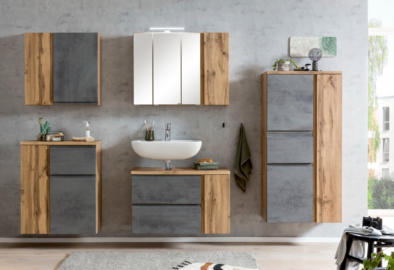 Moderner Badezimmer-Unterschrank in Holzoptik mit grauen Fronten, frontal betrachtet.