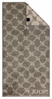 Handtuch mit geometrischem Muster in Grau- und Beigetönen, Markenname 'JOOP!' sichtbar, Draufsicht