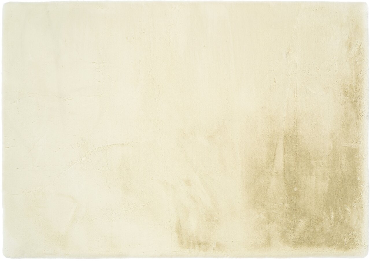 Beige Fellteppich in Draufsicht