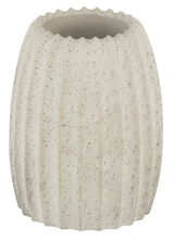 Zahnbürstenhalter Torretta in zylindrischer Form aus hellem, strukturiertem Material, frontal fotografiert.