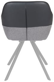 Rückansicht eines Sessels mit schwarzer und grauer Polsterung auf Metallbeinen.