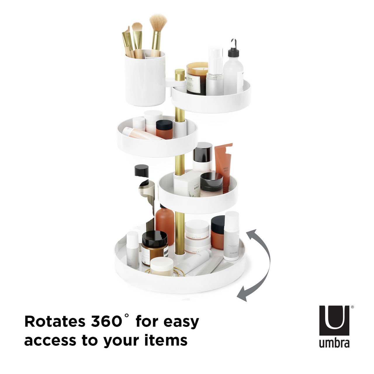 Weißer und goldener drehbarer Organizer mit mehreren Ebenen, gefüllt mit Kosmetikartikeln, aus seitlicher Perspektive.