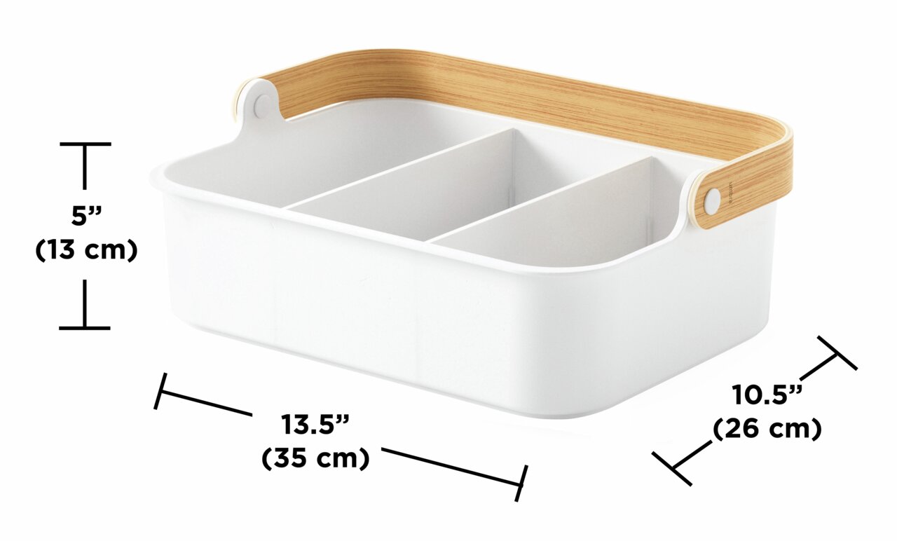 Witte opbergmand met drie vakken en een handvat van natuurlijk hout, zijaanzicht.