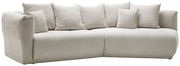 Beige Ecksofa mit mehreren Kissen, Perspektive von vorne links