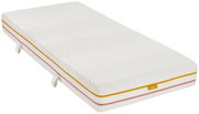 Matratze 90x200 SOFT/MEDIUM in schräger Perspektive, weiße Oberfläche mit strukturiertem Muster und farbigen Kanten.