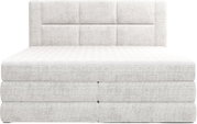 Lichtgrijs gestoffeerd boxspringbed met gewatteerd matras en rechthoekig, gestikt hoofdbord, frontaal aanzicht op witte achtergrond