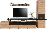 Wohnwand in Holzoptik mit schwarzem Akzent, bestehend aus einem TV-Schrank, einem hohen Schrank und einem Wandregal, frontal betrachtet.