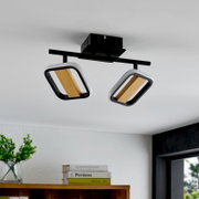 Moderne LED-Deckenleuchte mit zwei quadratischen Strahlern in Holz- und Metalloptik, von unten betrachtet.