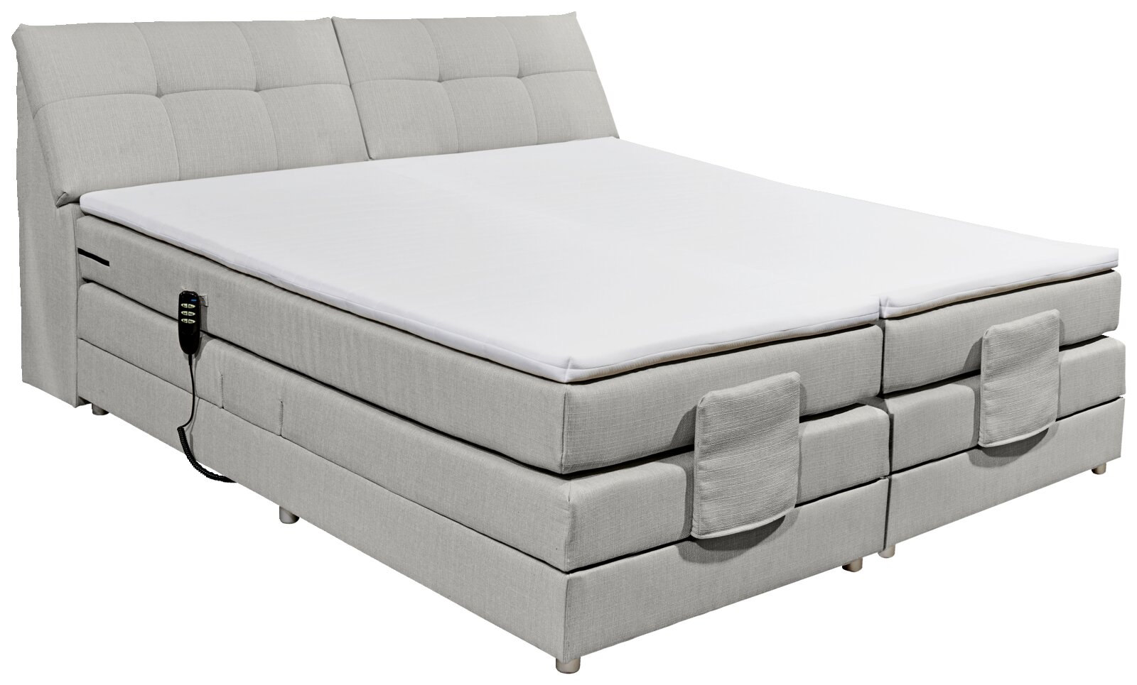 Boxspringbett in hellem Stoffbezug mit verstellbarem Kopfteil, seitlicher Perspektive