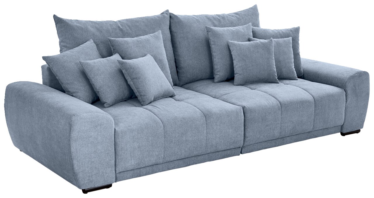 Großes, modernes Big-Sofa in hellblauem Stoff mit mehreren Kissen, seitliche Perspektive