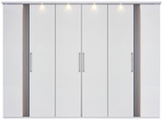 Sechs-türiger Drehtürenschrank in Weiß mit modernen Griffen und integrierter Beleuchtung, Frontalansicht.