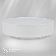 Weiße runde LED-Deckenleuchte im minimalistischen Design, ausgeschaltet, in leichter Draufsicht/Frontansicht auf grauem Hintergrund