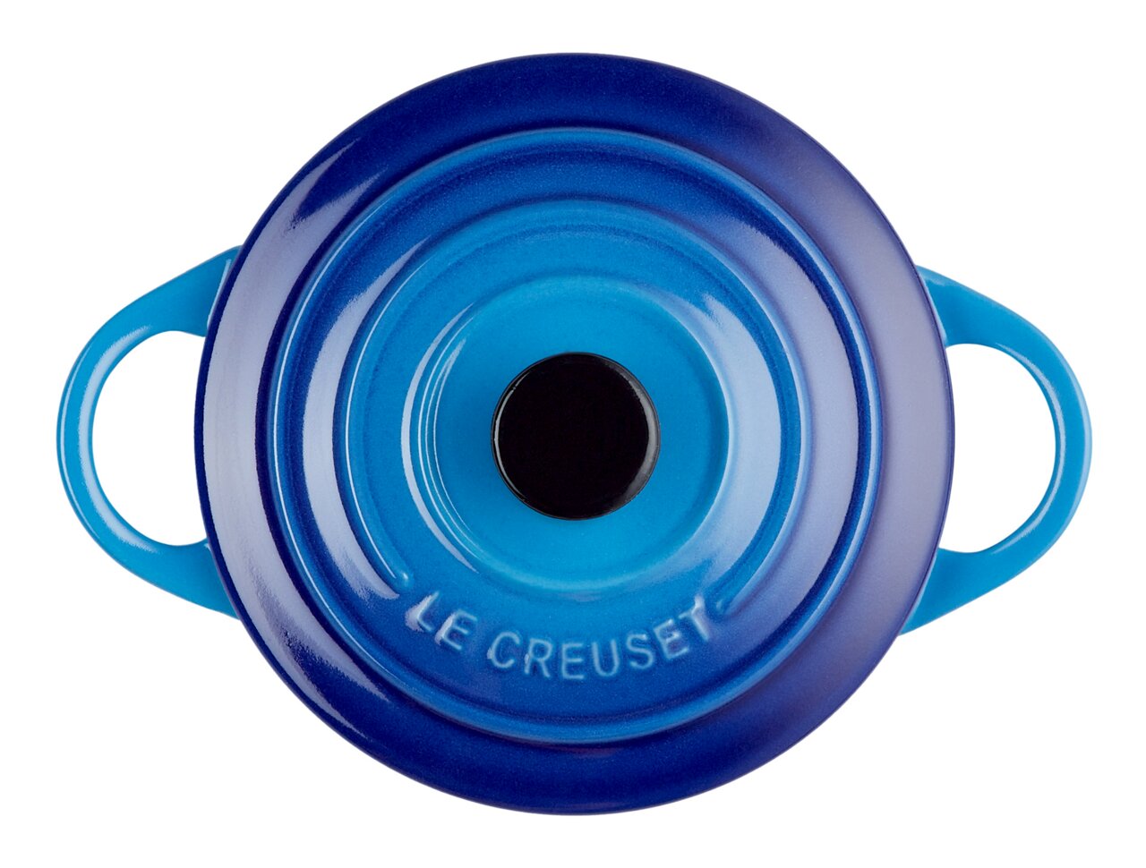 LE CREUSET Mini-cocotte 10 cm Azure Blauwe mini-cocotte gezien van bovenaf, met twee handvatten; het Le Creuset-logo is zichtbaar