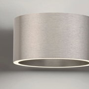 Moderne Wandleuchte PURE Clipse in gebürstetem Metall, seitliche Perspektive