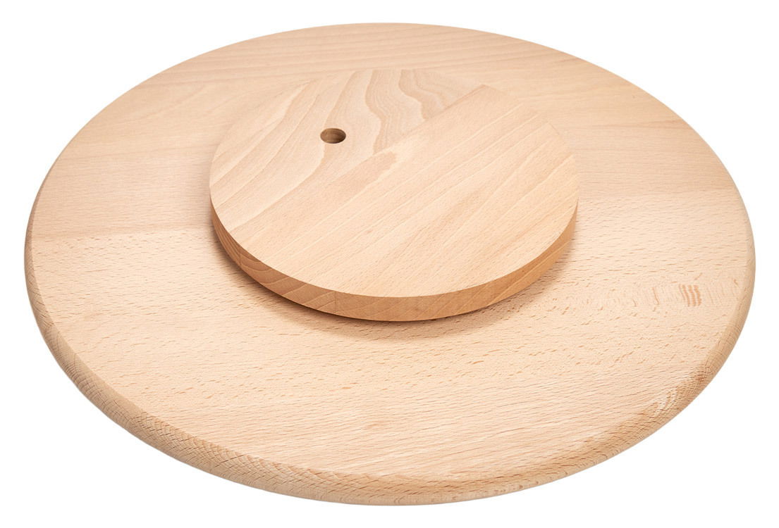 Rundes Drehkabinett aus Holz, von oben betrachtet, mit einem kleineren, mittig platzierten Drehelement.