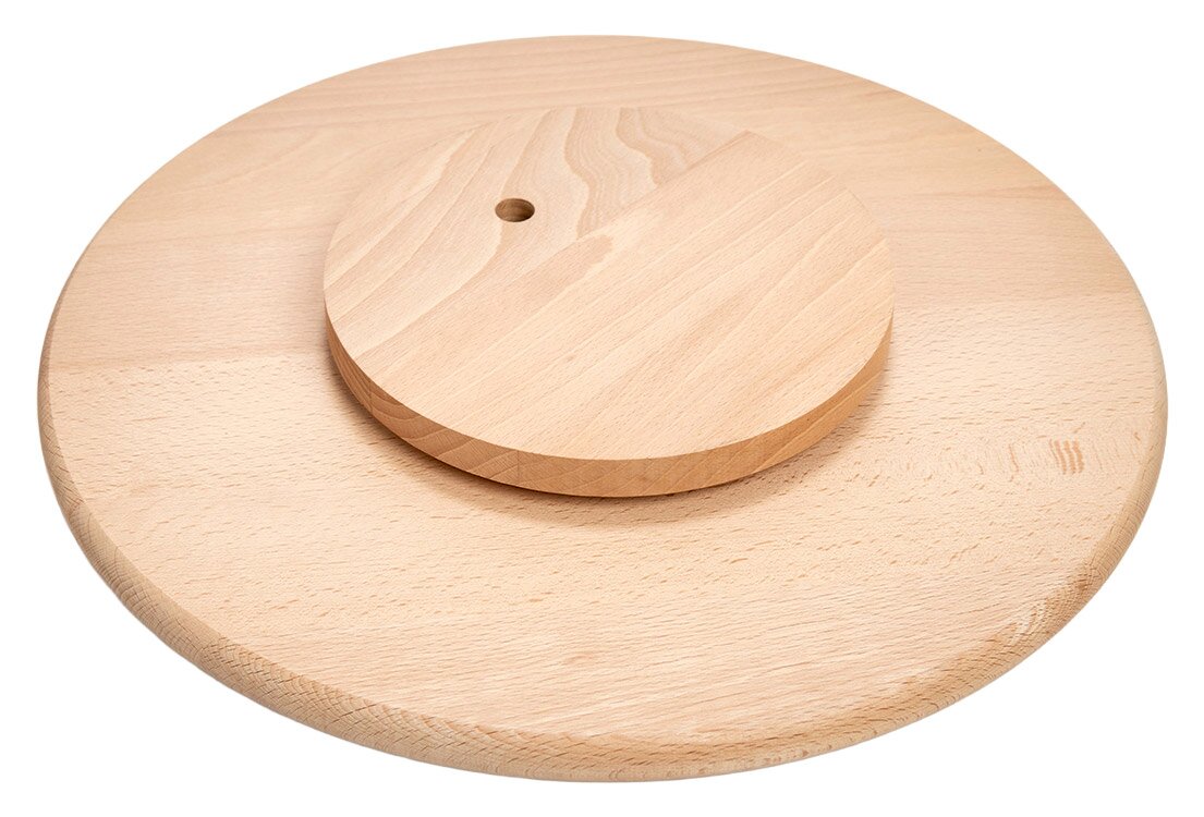 Rundes Drehkabinett aus Holz, von oben betrachtet, mit einem kleineren, mittig platzierten Drehelement.